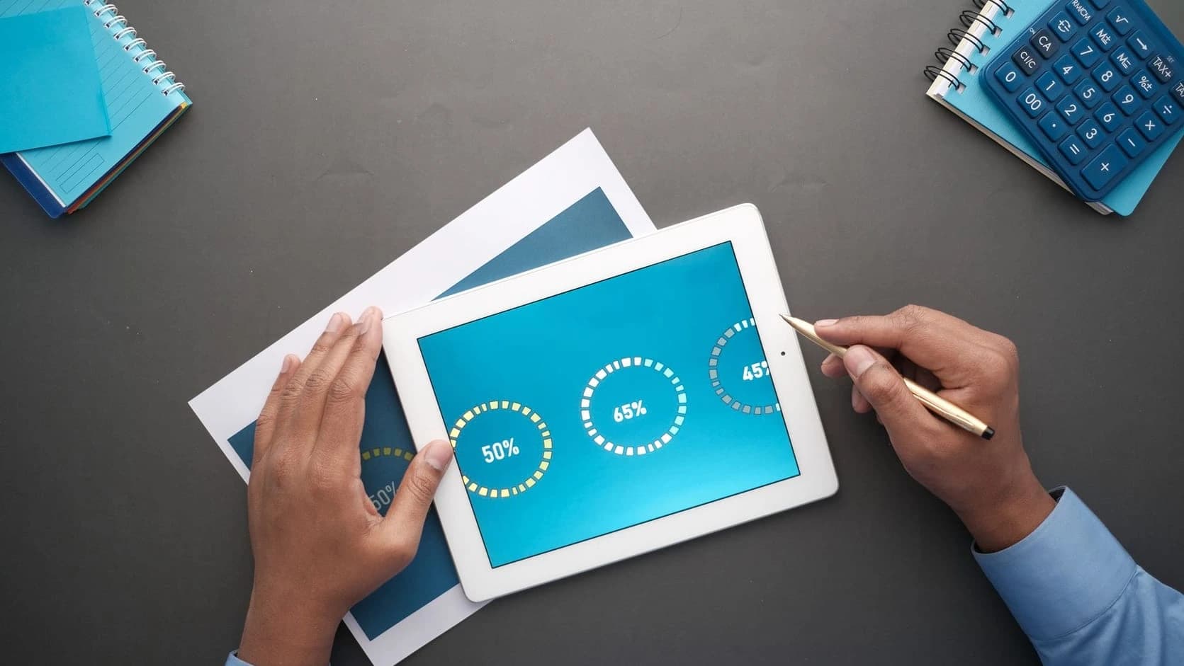 Representative entering customer notes into a tablet during a follow‑up call